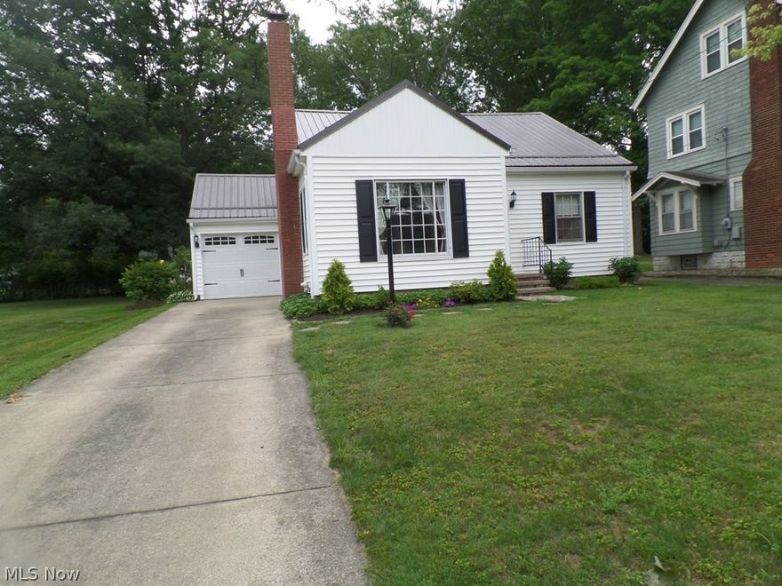 Lovely 3 bedroom fully updated home, with 2 full updated baths with tile in both. Master bedroom is on the first floor. Office on first floor could easily be restored to a bedroom.  Kitchen has been upgraded with newer appliances and kitchen cabinets. Air conditioner system replaced in 2013. New garage door and shutters have just been replaced. Furnace replaced in 2011. Additional interior upgrades 2012. Metal roof in 2014. Home is move in ready. Owner just had the outside windows professionally washed.  Call for an appointment today!