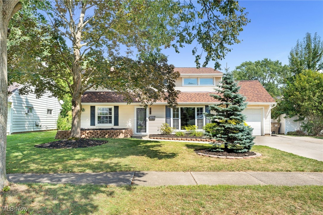Welcome to 3412 Atterbury St., a gorgeously renovated 5-bed, 3-bath home, offering over 3,000 sqft of living space in the peaceful neighborhood of Cuyahoga Manor. Upon entering the home, you're welcomed by an abundance of natural light filling the expansive living room w/an additional sitting nook. Just beyond, the stunning kitchen features a massive island, quartz counters, stylish tile backsplash, SS appliances, soft-close cabinetry & dovetail drawers, plus, a spacious pantry, LED recessed lighting, & a cozy area ideal for a banquette or bar setup. The open-concept dining room flows seamlessly from the kitchen & showcases a magnificent wood-burning stone fireplace w/raised stone hearth. From the kitchen, you'll find access to a space perfect for a mudroom, as well as access to the oversized garage. The serene, fully fenced backyard, accessible from the dining room, garage, or gated fence, boasts a new stamped concrete patio & lush landscaping. Back inside, a laundry closet w/upper cabinetry, a
bedroom w/built-in shelving, a renovated full bathroom w/tiled shower & bidet, and a bonus room perfect for an office complete the main floor. Upstairs, you'll find three generous guest bedrooms, another bonus rm, a renovated full bathroom w/tub-shower insert, & a tremendous primary suite. The primary suite has two W/I closets w/built-ins & a renovated en suite w/large shower, granite countertop, matching backsplash & bidet. This home has so many new updates including but not limited to roof (2023), one A/C (2022), HWT (2021), luxury vinyl wood-style flooring, lighting fixtures, plumbing fixtures, electrical panel, baseboards & trim, paint, newer replacement windows, & much more! Ask for an extensive list of renovations & updates. Located mere minutes from several parks, amenities, food, & entertainment, this home also offers an optional membership to the Cuyahoga Manor Recreation Assoc. & pool. This home truly is a dream come true! Schedule your showing today!