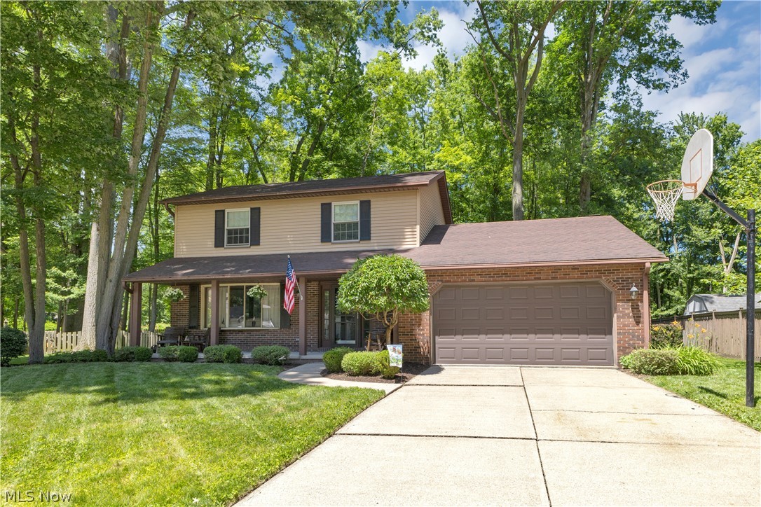 Don't miss this 3 bedroom, 2.5 bath covered front porch Colonial in the Brentwood Estates neighborhood of Olmsted Township. This beauty is nestled on a quiet cul-de-sac street. The eat-in white kitchen features granite counters, pantry, and bay window in the eating area. All kitchen appliances will stay. The living room has an additional bay window and the dining room can be set up as a formal dining space or even an office. The home has a coveted open floor plan where the kitchen has great sight lines to your family room with wood burning fireplace and custom wood pallet wall. Head out to your deck to enjoy the day in your private fully fenced park-like backyard with mature trees. There you can listen to the birds and the water flow in your designer koi pond, or you can hang out in your fully equipped "General Store" workshop/shed space which is in addition to the 2-car attached garage with ample storage above. There are 3 bedrooms upstairs and a full bath off of the owner suite and hall. Head down to the partially finished basement where there is space galore including a 2nd full bathroom, workout space, recreation room, and utility room. This home is within walking distance to the elementary, middle, and high schools, public library, as well as just a short drive to downtown historic Olmsted Falls and Grand Pacific Junction. There is no RITA tax in the Township. Pride of ownership shows inside and out---super clean and meticulously kept home!!!!