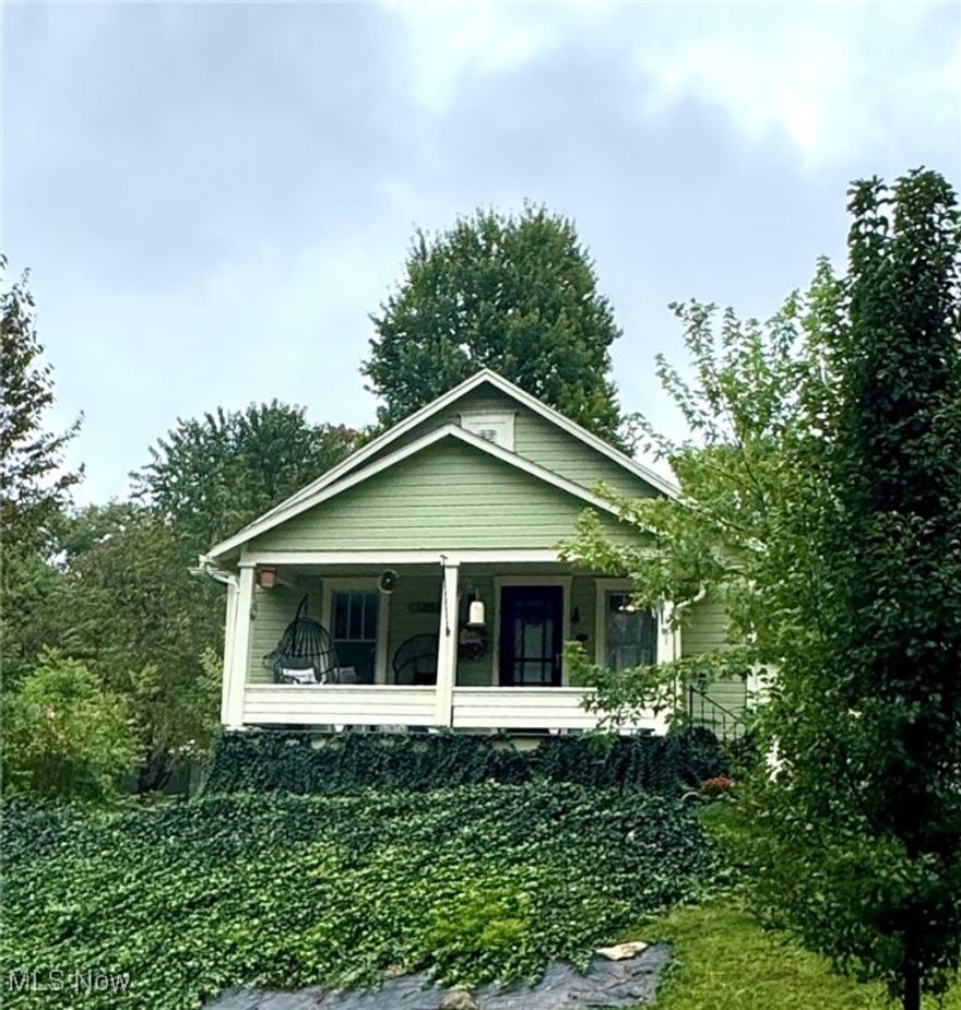 You will certainly be pleased with this manageable and charming home positioned in Roscoe village in Coshocton, Ohio. This 2-bedroom bungalow has fantastic curb appeal and charm throughout. New flooring, paint, handmade bathroom cabinet, and a country kitchen featuring the original farm sink will make it worth your time to view! Details include 200-amp service, blown-in insulation in the walls and ceiling, city water with new water line to the street, city sewer and electric baseboard heat.  The owners say that they love sitting on the porch and watching all of the activities in the village! This will be a great place to live and love!