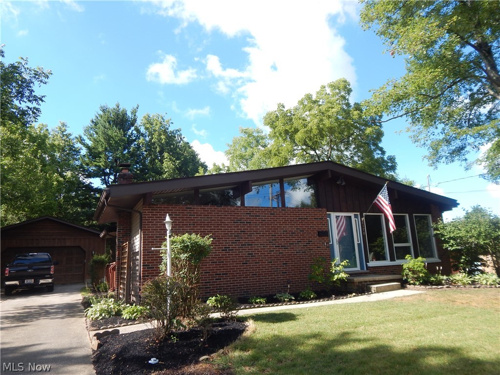 Updated Ranch , featuring large 4 car tandem garage. Rec. Room, Laundry Room, Deck