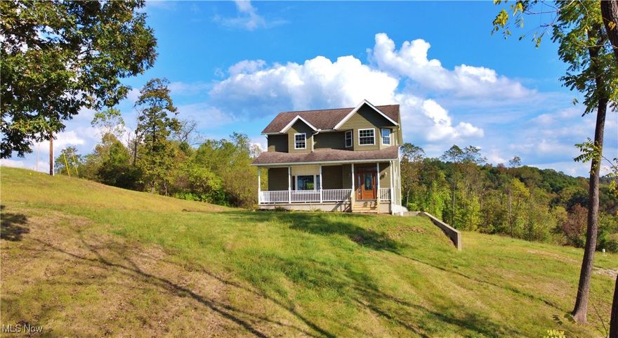 Welcome to this beautifully crafted 3-bedroom, 4-bath home perched on a hilltop in Caldwell, Ohio, offering breathtaking views and peaceful surroundings. Built in 2015 and thoughtfully designed with quality and comfort in mind, this 2,120 sq ft custom-built home combines timeless style with modern convenience.  Highlights include a spacious master suite with a luxurious en-suite bathroom featuring a double vanity, walk-in shower, large garden tub, and a spacious walk-in closet.  Gleaming hardwood floors throughout the home with generously sized living areas, perfect for family life and entertaining.  Oversized garage with radiant heated floors for added comfort, along with solid poured concrete foundation walls for durability and peace of mind.  Abundant natural light and panoramic views from the elevated lot.  Enjoy the privacy of a scenic setting with the convenience of being just minutes from downtown Caldwell.  This home offers a rare opportunity to own a high-quality, move-in ready property with custom features and thoughtful finishes throughout.