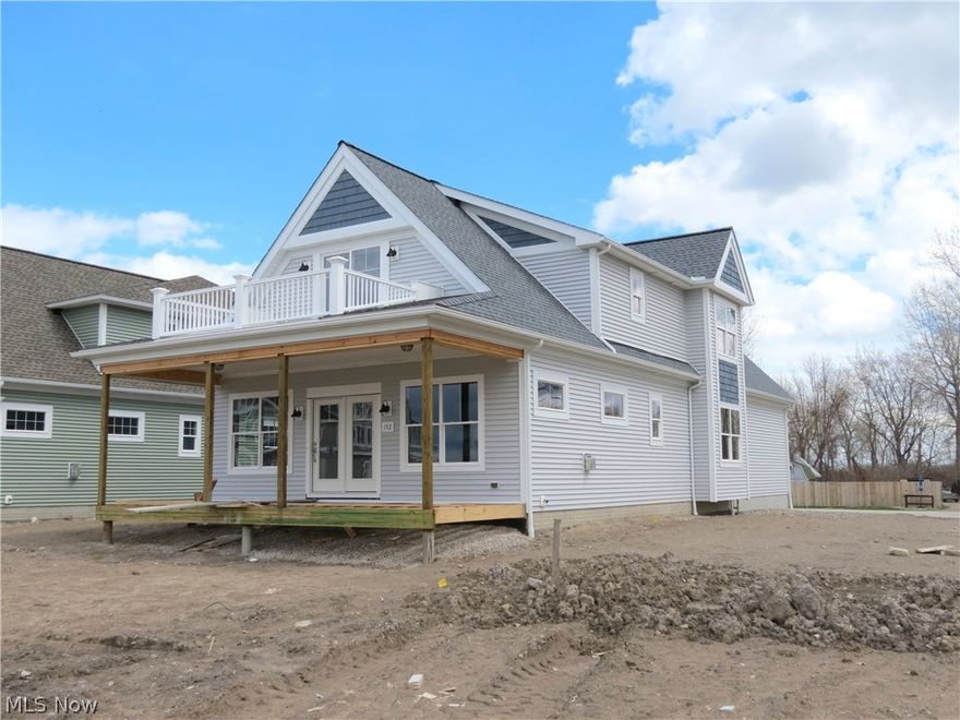 This is it, Our Last Villa at Bay Point to be Completed in May! New Floor Plan featuring 5 Bedrooms with 4.5 Baths! 3 Master Suites with Private Luxury Baths! End Unit with Large side yard! 1st Floor Front Porch and 2nd Floor Deck offer Views of the Sandusky Bay & Gorgeous Sunsets! * Expanded Kitchen with Large Island and Walk-In Corner Pantry * Spacious Open Floor Plan Offers Great Room Open to Kitchen and Dining Area * Luxury Items Include Hardwood Floors, Granite Counters, Custom Amish Cabinets, 9' Ceilings 1st Floor, Stainless Steel Appliances, Stack Washer & Dryer and Custom Detailed Wood Trim Throughout and Professionally Decorated with Nautical Colors * Includes Access to Clubhouse & Pool with Fitness Center, Restaurant on the Beach, Market, Concession Stand and Tiki Bars. Bay Point, a Private Gated Community offers Sandy Beaches, Par 3 Golf Course, 730 Slip Marina, Picnic Areas, Sports Courts and New Water Taxi to Cedar Point