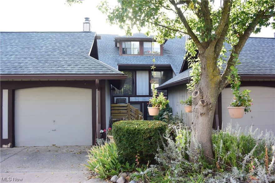 Walk at street level. First floor bedroom and full bath, also a view of the pool. New front deck, lower level, full bedroom and bathroom. Fresh paint and carpet on first floor. Two new air/heat air conditioner, fully applianced, attached garage, newer deck and steps to front door, updated dishwasher, baseboard as heat, condo fee includes everything but electric and cable. Community pool (near pool), great location to the national parks, restaurant, shopping, and easy access to Akron and Cleveland.