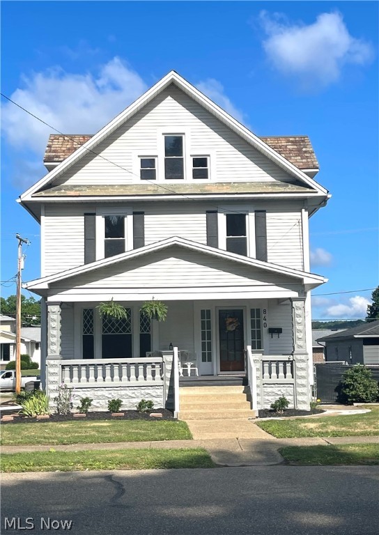 This is a must see beautifully renovated home on the south side of New Philadelphia. This home has 5 bedrooms and 4 bathrooms. Walk into the grand 12X15 foyer with beautiful original woodwork, built in bench, and stairway leading to the second floor. To the left from the foyer is the large living room and then onto the expansive formal dining room perfect for family dinners. Lots of windows making the area cheery. The kitchen can be accessed from the dining room or from the main foyer. New range, microwave, dishwasher, undermount sink, faucet and recessed lights. Refrigerator is not new but stays with the home. Granite countertops and an eating area in the kitchen. There is also a back staircase leading to the 2nd level from the kitchen as well as the main stairway. Renovated bathroom w/a shower and laundry off the kitchen. Tile floors. The 2nd level has 4 bedrooms and full bathroom with tile floors. Bedrooms have new carpet with new lights. The largest bedroom is on the 3rd floor 18X23 with two closets and a full bathroom. You get to the basement level from the foyer or kitchen. There is also a side door as well that leads to the main level or lower level. There are three finished rooms in the basement and a full bathroom. There could be two more bedrooms in the basement if needed. You get to the attached garage from the basement level. Inviting 9X22 covered front porch. This home would be great for an in-law suite or additional family with the side entrance and basement rooms and bathrooms. New furnace and central air in 2023, repairs on the slate roof in 2023 $4,900.00. Granite Countertops, New asphalt roof over the covered front porch. 2 new Storm doors. The entire home has been painted including the basement. Fenced back yard with a dog run and 8X12 shed. The yard is alley bound. Close to shopping. South Side Elementary School.