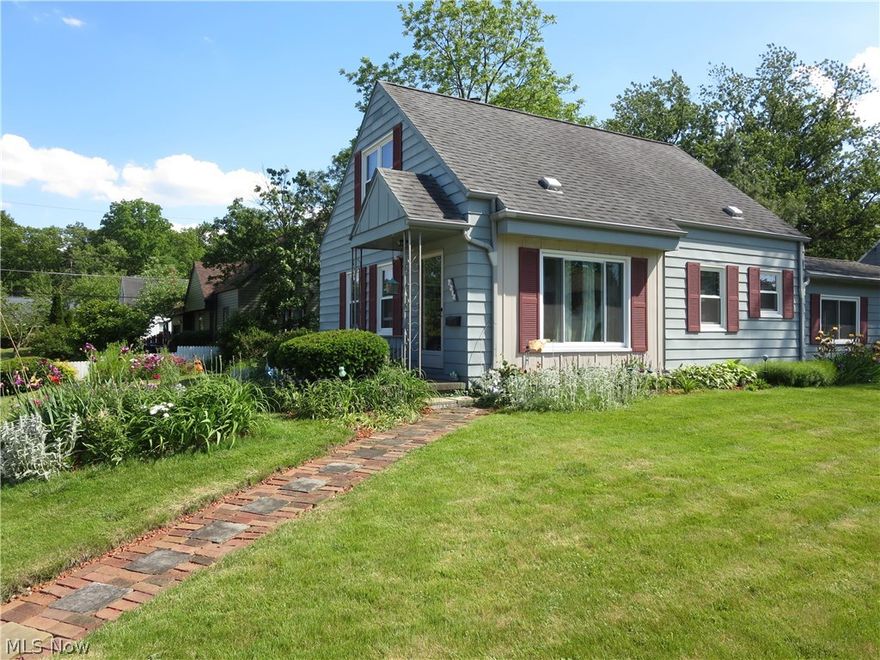 Don't miss out on this nicely updated and spacious cape with an awesome, expanded first floor family room addition with a woodburning or gas fireplace and included dining area.  Seller states this home has hardwood flooring under the carpet in living room and bedrooms.  Most of the interior has been recently painted.  The kitchen updated cabinets and room for a cafe table or more additional cupboards and counter space.  In addition to the two first floor bedrooms, the upstairs can function well as a master bedroom with separate area for a home office or other use.  There's also a finished recreation room for additional living space.  Current owner has pampered this home!  There's newer replacement windows approximately 3 years old with transferable warranty.  Seller also had whole house insulated approximately 8 years ago.  Basement was waterproofed in 2009 by Ohio State Waterproofing and has a transferable warranty.   Kitchen appliances stay.  Family room leads to patio and fenced yar