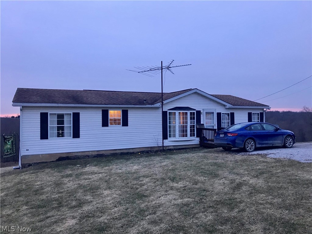 Double wide sitting on 22.8 acres in a very private country setting. Home consist of a master bedroom with a master bath and a walking in closet. 2 bedrooms and another full bath on the other side of the house with laundry room. home sits on a full basement but, can only be accesed from the outside.