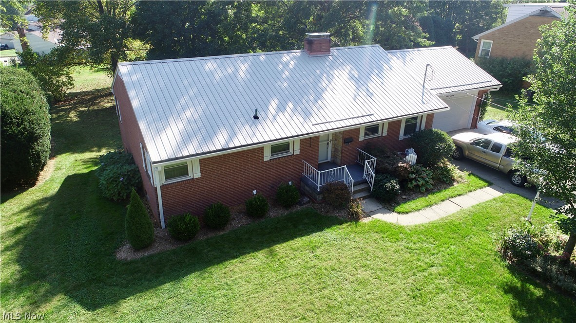 Move right in! This four bedroom brick ranch is located not only close to the College of Wooster but also close to public amenities and has easy highway access. The main level features two bedrooms and a full bath. The large living room leads to the deck which overlooks the back yard. The Laundry is also conveniently located on the main level.
The lower level welcomes you with a cozy fireplace in the family room which leads to the partially enclosed patio. It also has 2 bedrooms and a full bath. This home is being sold as is.
Many updates which include but are not limited to - roof, windows, and furnace 2013, hot water tank and thermostat.
