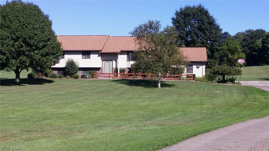Rare opportunity!  2.41 acres with 3064 sq. ft. home.  5 bedrooms, 3 full baths.  Very open and spacious.  If you're looking for the one, this is it!  Nice bedrooms, two with walk-in closets; three up and two down.  Main floor has open great room to the kitchen, dining and family area with cathedral ceiling. Beautiful cabinetry, nicely laid out to entertain.  Master bedroom has its own master bath and walk-in closet.  Lower level has a huge family room with full bath, laundry room, office and two bedrooms.  Paved driveway with 25 x 25 over sized garage and a barn shed in the rear.    To much to mention here!  This is your forever home!  Call before it's gone!