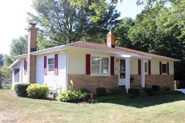 Picture perfect one owner 3 bedroom, 1.5 bath raised ranch beautifully updated & maintained* Approx. 1584SF including 4 season sun room & lower level rec room* Neutral décor throughout* Updated carpet (10/2014) living room, dining room and hall* Wood floors under carpet in living room and bedrooms* Oak kitchen with island & fully applianced (refrig, burner top, oven, microwave, dishwasher & disposal), disposal and dishwasher approx. 2 years old* Master bedroom with private access to half bath* 4 season sun room (3-4 years) with access to patio with built in gas grill* Light and bright recreation room with brick fireplace (wood or gas) & updated ceiling, lights & flooring (2014)* Other updates include Carrier furnace (2007), hot water heater (2012), air conditioner (3-4 years), pressure tank (2013), electric box (4-5 years), shingles , spouting & gutter guard (7-8 years)* Generous 2 car attached with hot & cold water & openers* 14x16 utility building with 2 lofts, electric & phone* Love
