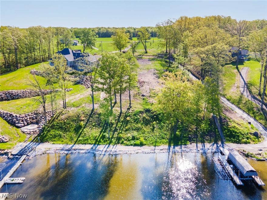 This is YOUR chance to own over 1.5+ acres of LAKE FRONT property!! Perfect for the lake home you've been dreaming of. Boating, jet skiing, kayaking, swimming, fishing, camping, bomb fires it's all right here at your fingertips!! If you love the lake life this is your chance to make your dreams, come true. West facing for some of the most beautiful sunsets and views of the lake you can imagine! Dock, city water/sewer, gas & electric available. Lot has been surveyed, cleared and ready to go. Enjoy the relaxing water this summer with family and friends on this true gem!!! Don't miss this opportunity to own a lake front lot before they are all GONE!