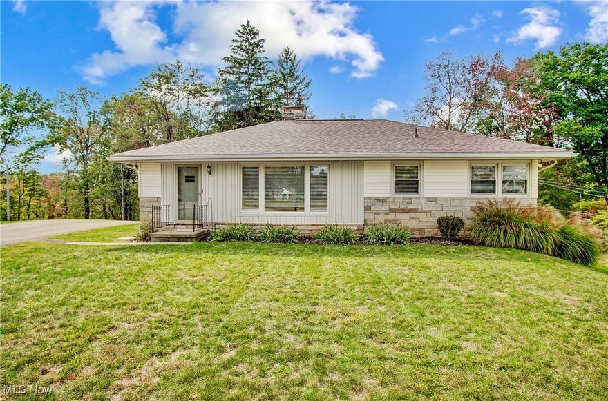 Welcome home! This charming, well-maintained ranch on Zanesville's north end offers convenience and comfort! The home boasts a new roof (2022) and upgraded electric panel, ensuring peace of mind. Enjoy updated flooring, including beautiful hardwood in the bedrooms. You'll love the spacious blacktop driveway with ample off-street parking! The partially finished walkout basement features a toilet, shower, and washtub for the extra convenience of a bathroom in the laundry area. Step out from the kitchen onto a covered deck, perfect for relaxing, and take in the private, serene backyard. Don’t miss this move-in-ready, rare gem!