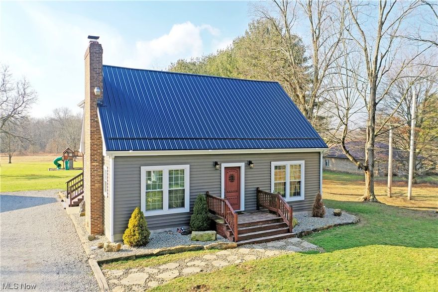 Revel in the stunning good looks found inside and out of this must-see Vienna home, showcasing three finished floors of perfectly executed modern farmhouse style! Recently renovated from top to bottom, the home offers tons of new mechanicals to include HVAC and well work. A massive, 30x40 outbuilding joins the wraparound gravel driveway with concrete flooring and a wood burning furnace. Meanwhile, the picture-perfect home steals the show with its matching metal roof, fantastic deck work and stone landscaping. The three-acre property oversees an included fire-pit, play area and livestock pen. A rustic entry door welcomes you inside to find the main hall running alongside the main staircase as dark, hardwood styled flooring resides underfoot. The sun washed living room takes full advantage of its large windows while a stone trimmed mantle houses a gas fireplace. Formal dining looks on as it enjoys scenic backyard views and easy patio access. Splitting the kitchen, a striking half bath brings ornate tile work and sleek, minimalist design elements with shiplap wall treatment. The kitchen itself continues the theme with its farmhouse basin sink, stained wood countertops and unique glass door pantry. Hidden first floor laundry sits around the corner. Completing the floor, a sizeable master bedroom brings dual closet and a lavish full bath with paired vanity and a glass stall shower. Upstairs, a pair of bright and inviting guest bedrooms flank a second full bath. A partially finished basement enjoys carpeted rec space with offset storage and utilities.