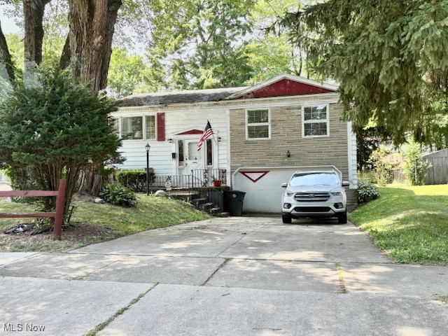 Don't miss this Well Built Home in a location of walking to Grocery stores, Restaurants and more. Relax in spacious Living Room adjoining the Dining Area each with full size picture windows overlooking the yard. This roomy 3 Bedrooms, 1 Bathroom Home also has a nice lower level of a Finished Rec Room that comes in from the 2-car Garage. In the Garage is a large Workbench, Electric double garage door and sump pump. The Double Driveway can accommodate 6 vehicles parked if needed too. Check out the nice size deep backyard that was fenced in before. Updates throughout: Roof 10 yrs, Furnace 3 yrs, Sump Pump 3 yrs, Carpeting throughout, lights and ceiling fans too. Schedule a Showing Today....