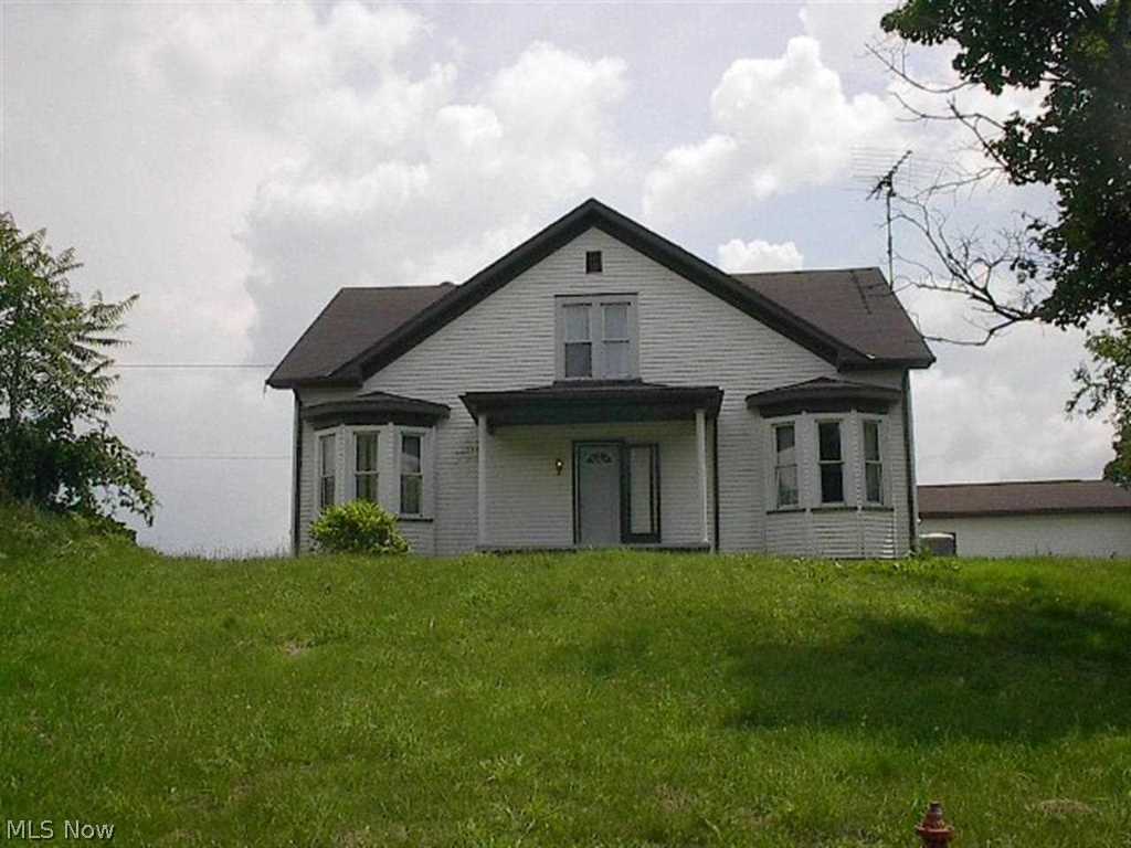 Large 4 bedroom home. Huge rooms. Nice 2 car detached garage. Country setting. No mineral rights conveyed.