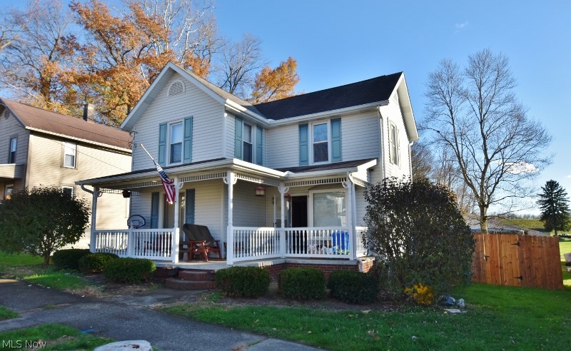 Very nice, well cared for & updated 3 bedroom, 1.5 bath in the charming town of Magnolia in the Sandy Valley School District. Many major recent updates include New Carpet throughout, Lifetime Warranty Basement Waterproofing System 2020, Updated Electrical Service & Wiring, Furnace 2019, Dishwasher 2019, Refrigerator 2018 & wooden privacy fence perfect for small children & pets. You will love relaxing on the huge covered front porch or the enclosed heated back porch. You will love the oversized 30x32, 3 car garage w/ a 12x30 attached carport & concrete driveway. An extra lot located behind the home provides additional space for family fun or additional buildings if desired. The main floor includes a spacious updated eat-in kitchen with a beautiful bay window, spacious living room, mud room & convenient 1/2 bath. Upstairs provides 3 bedrooms & a full bath. Very spacious dry basement offers room for a workshop & provides great space for storage. Within a 20 minute drive of Canton, Dover &