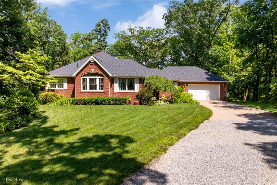 Proudly owned by a single family since its construction. This home reflects a legacy of meticulous care, thoughtful upgrades, and enduring quality. This exceptional all brick ranch estate sits on 9.2 acres surrounded by mature trees, offering high-end craftsmanship and sought-after features for comfort, functionality, and entertainment. This custom-built home showcases red oak cabinetry throughout, an open-concept layout, and a spacious kitchen with a large pantry. Nestled on a sprawling property with picturesque natural surroundings, this home provides an unmatched sense of privacy and exclusivity. Whether you're looking for a quiet sanctuary or a place to entertain, the home is designed to accommodate both. The attached heated garage includes glazed tile walls, hot and cold water, keyless entry, a brick chimney, for a wood stove. The fully finished entertainment basement is designed for hosting and relaxation, featuring a full-size bar and pool table. Additional approx. 1500 sq. ft. in basement finished. The master suite offers direct access to a decorative brick and stained concrete courtyard, providing a private outdoor retreat. With high-end finishes, extensive storage, and premium structural features, this estate is an excellent choice for buyers seeking privacy, space, and a home built for both relaxation and entertaining. 3 car detached garage 24 x 55