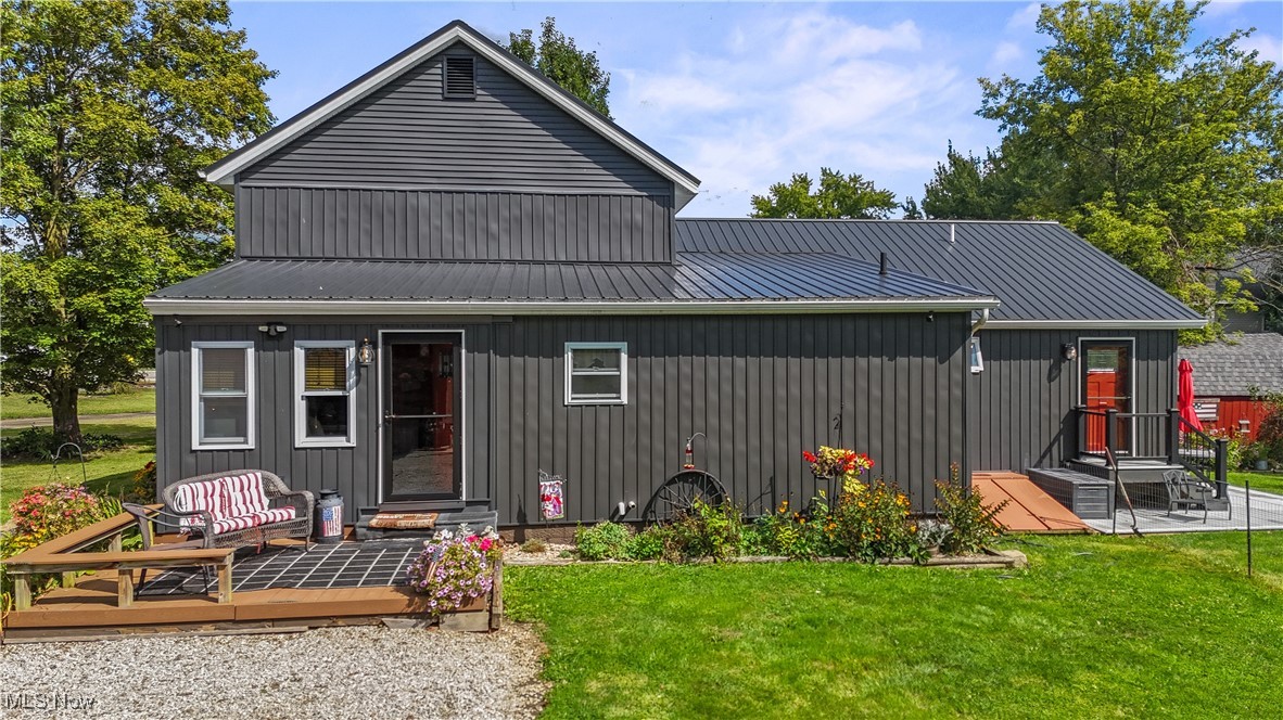 Charming 4-Bedroom Home on 2.03 Acres with Outbuilding & Updates! Welcome to your own private retreat! This beautifully maintained 4-bedroom, 3-bathroom home is nestled on a spacious 2.03-acre lot, offering the perfect blend of comfort, space, and functionality. The main floor features a primary bedroom with a cozy fireplace, perfect for relaxing evenings, and a full bathroom nearby. Enjoy the convenience of main floor laundry and a sunroom that overlooks the fully fenced backyard, ideal for morning coffee or entertaining. Updated in 2022, the roof and siding provide peace of mind for years to come. A whole-house generator (installed in 2022) ensures you're always covered during power outages. Car enthusiasts and hobbyists will love the large outbuilding with 3 garage bays, offering ample space for vehicles, tools, and toys. Don’t miss this rare opportunity for quiet country living with modern updates! PLEASE ALLOW 48 HOURS for response to any offers.