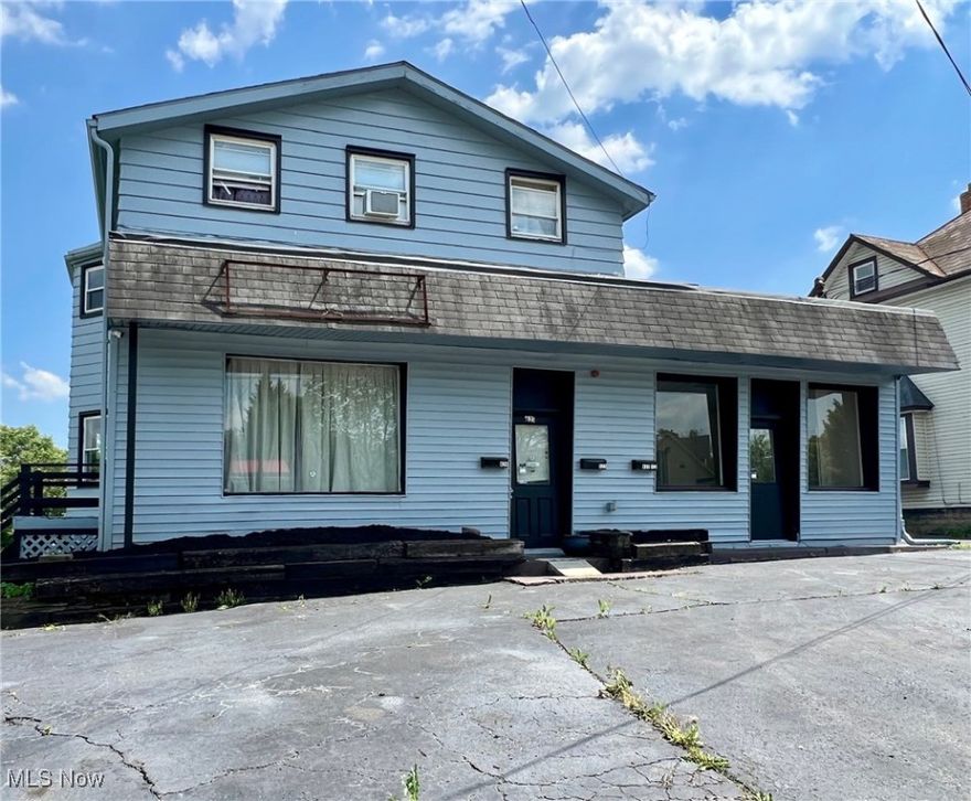 Unique opportunity for apartments/duplex with attached business frontage. Previously a used car lot, this has potential for another retail business. This is a duplex which offers 1364sf living each unit (one up, one down). Both units currently tenant occupied. Conveniently located near the intersection of Elm and Woodland.