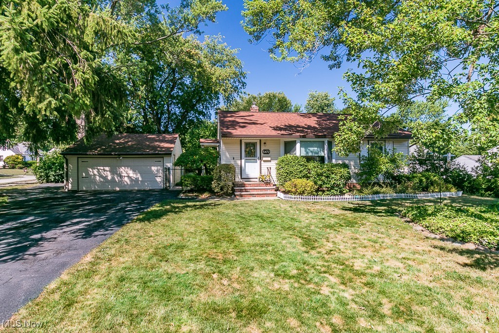 Welcome to this charming ranch-style home, perfectly situated on a corner lot with mature landscaping and a private, fenced-in backyard. This home features 3 bedrooms and 1 bathroom on the main level, with an additional bathroom and rec room in the partially finished lower level. Step inside to discover a cozy living room highlighted by a large bay window that fills the space with natural light. The kitchen comes equipped with a refrigerator, dishwasher, and range, making it ready for all your culinary needs. Enjoy outdoor living on the patio, surrounded by mature trees and a serene, private yard. The property also includes a shed for additional storage and a 2-car detached garage. Brand-new updated bathroom! With its prime location and thoughtful updates, this home offers a comfortable and convenient lifestyle. Don’t miss your opportunity—schedule a showing today!