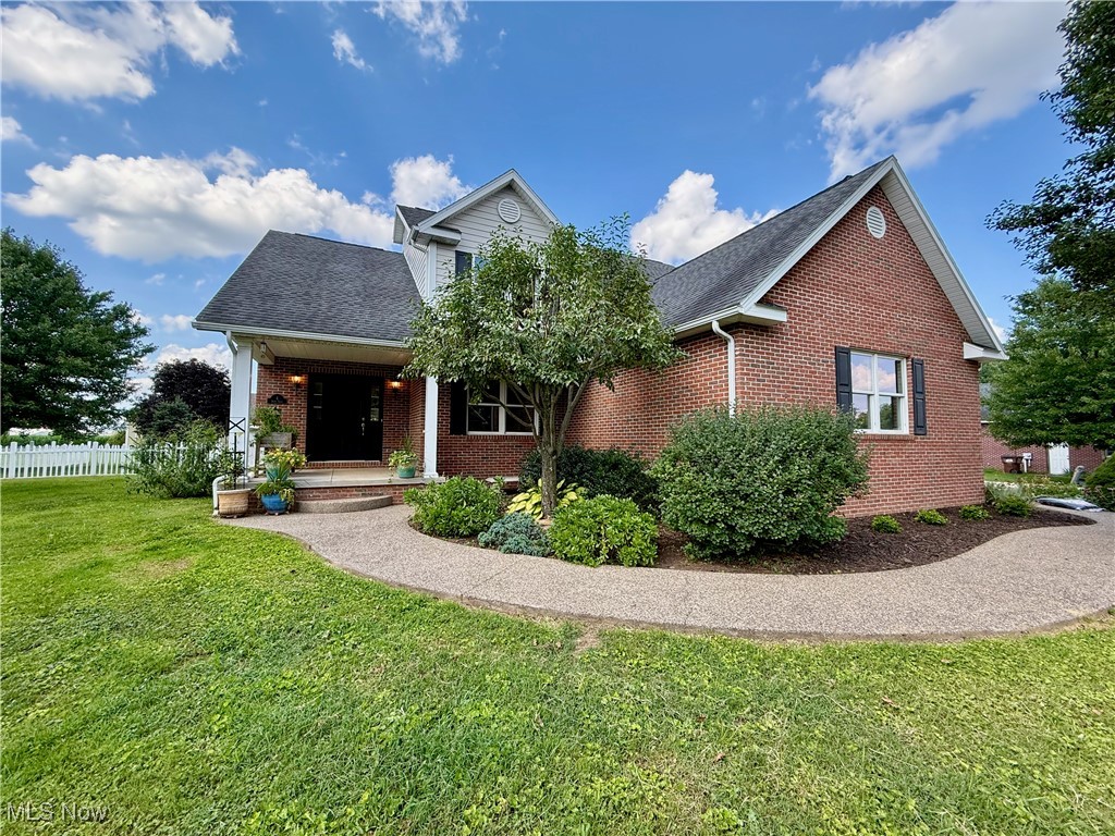 Tucked along a quiet cul-de-sac on the edge of Devola, this solidly built 4-bedroom, 2.5-bath home offers the space, layout, and quality construction that’s increasingly hard to find. Built in 2009 with 2x6 framing, full brick exterior, HardiPlank accents, and Andersen wood windows—this is a home with real bones, not just curb appeal.
Inside, you’ll find a main-floor primary suite and laundry, a soaring great room ceiling with gas fireplace, hardwood floors, solid wood interior doors, and generous closets. A main floor flex space and a second floor loft add extra flexibility for work, play, or guests. The structure and systems are rock solid—including a 2020 HVAC system, PEX plumbing on a maniblock system, and a fully insulated, finish-prepped basement ready for your vision.
Enjoy nearly half an acre with a wide driveway, vinyl picket fence, mature landscaping, and a screened-in patio made for quiet mornings or laid-back evenings.
Convenient to I-77, OH-60, and OH-7, this Devola gem has everything you can't add later. Bring your style and build your equity!