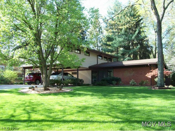 Wonderfully private home in the North Hills area has a flowing floorplan and several updates including updated kitchen by John Gillard. Vaulted ceilings and woodburning fireplace in the formal living room, several built-ins throughout the home, carpeting, flagstone, stone and tile flooring, fenced backyard offers wooded privacy and a peaceful retreat. Hand-laid bricks create beautiful accents amidst mature landscaping, flowers and trees. Double lot and convenient location. Come see the relaxation this home affords! Elem: Putnam Elementary School Elem/Bus: Y JrHigh: Marietta Middle School School JrHigh/Bus: Y High: Marietta High School High/Bus: Y Fire: CIT Police: CTY ;SQFT=Fin L1:1260, Fin L2:1056, Fin Bsmt:821, Fin Above:2316, Fin Total:3137, Unfin Above:0;GAR= 2 Car Carport;PRKG= Off Street, Parking Pad