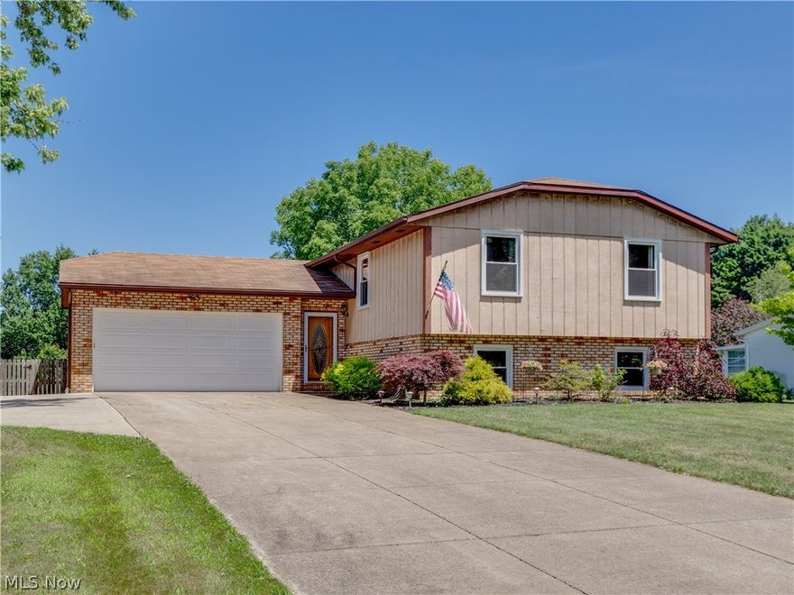 Beautiful Bi-level in the HEART of Lake Township. This 3 bedroom, 1.5 bath, 1836 SF Home on .55 Acre Lot is conveniently located close to shopping and schools. Modern open floor plan with Fully Applianced Kitchen with 2 Breakfast Bars open to Living Rm/Dining Rm with Sliders that leads to a 23x22-2 Level Deck attached to 15' Above Ground Pool.  Some major updates throughout the home include New Windows(2017), New High Efficiency Furnace, A/C Unit with Attached Humidifier(2015), Sump Pump, Pressure Tank(2018), New Pool Liner(2015), New Lower Deck(2016), and 30 YR Roof(2001). The lower level of the home has a Spacious Family Rm with a Wood Burning Fireplace with gas logs and a Bar area equipped with Wet Bar, a Finished Bonus room with ample Storage Cupboards, and Laundry Room with Counter Top and Storage Cabinets. There is a 2 Car Attached Garage has ample Storage Shelves and extra Work Bench Area that leads out to a Patio and fully Fenced Backyard with 6ft Wood Privacy Fence and 12x16 Storage Shed. A Home Warranty is provided with home. You won't want to miss this one.  JUST MOVE RIGHT IN!!