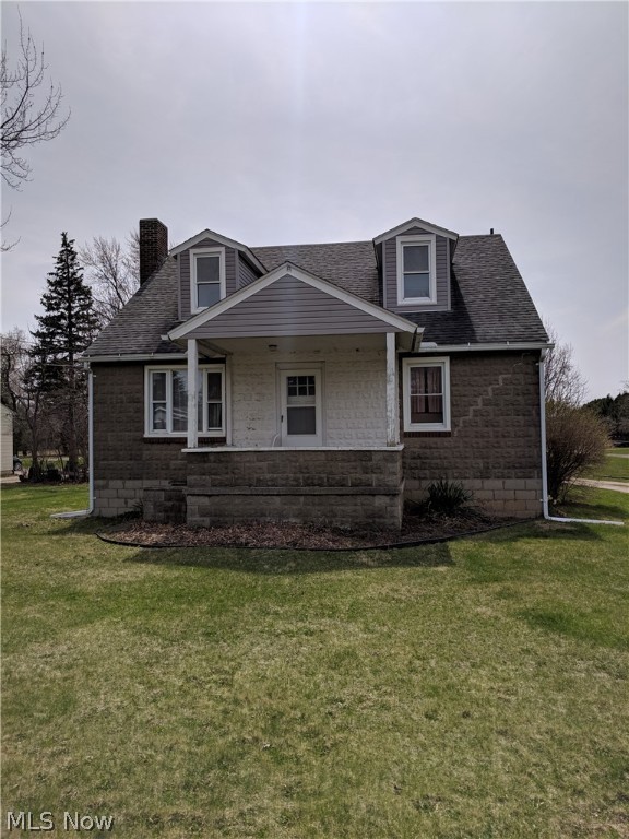 Solid constructed home with large kitchen, newer roof and hot water tank located in Huron School District. This home sits on almost a half acre lot with a open front porch and partially fenced in yard. Needs updating but has great potential to a wonderful starter home. Home being Sold As-Is