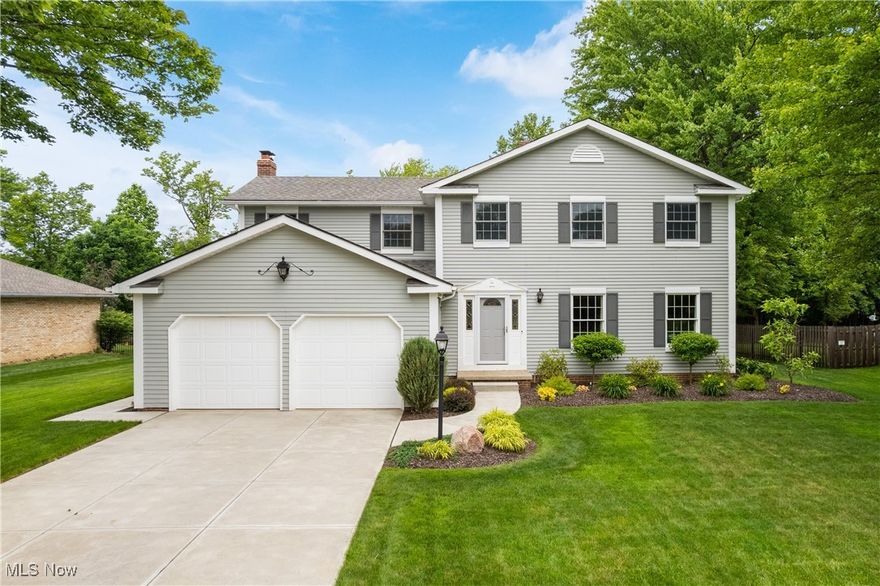 Welcome to this polished and updated traditional colonial, located in a quiet and friendly neighborhood in North Royalton! This meticulously maintained home showcases quality millwork, thoughtful design, & attention to detail throughout! Step into the spacious formal living room filled w/natural light & elegant architectural touches. The elegant formal dining room features crown/chair molding, perfect for hosting. Prepare culinary delights in the gourmet kitchen, boasting a full remodel in '23. The kitchen showcases extensive cabinetry w/accent lighting, Cambria quartz countertops/backsplash, SS appliances, & an eating area w/deck access. This luxurious family room is a showstopper w/a coffered ceiling, W/B fireplace, & custom built-ins/shelving ('23). A convenient half bathroom & laundry room w/ample storage space complete the main level. Upstairs, the owner’s suite offers an exceptional accent wall, walk-in closet, & ensuite bath w/a newer vanity ('21). Three additional bedrooms (2 w/newer carpet '25) & a full bathroom ('23) complete the second level. The fabulous, finished basement expands your living space w/a recreation room featuring custom built-ins, a second family room w/a gas fireplace, wet bar, office space, & a full bathroom. Outside, enjoy a true backyard oasis featuring .44 acres with a wooded deck, brick patio, huge shed w/a covered porch, & expansive greenspace with a wooded backdrop. An attached 2-car garage and RV parking with a 30-amp circuit add convenience. Located in the desirable North Royalton School District, this home is close proximity to Metroparks, shopping, hospitals, the airport, schools, and major expressways! Additional major updates include: furnace & A/C ('20), gutter guards ('20), chimney rebuild ('21), exterior painting ('21), new driveway/sidewalks ('21), foyer/family room remodel ('23), & new roof (to be installed by seller in July 25). Don’t miss the opportunity to own this move-in ready gem! This manicured home is a must-see!