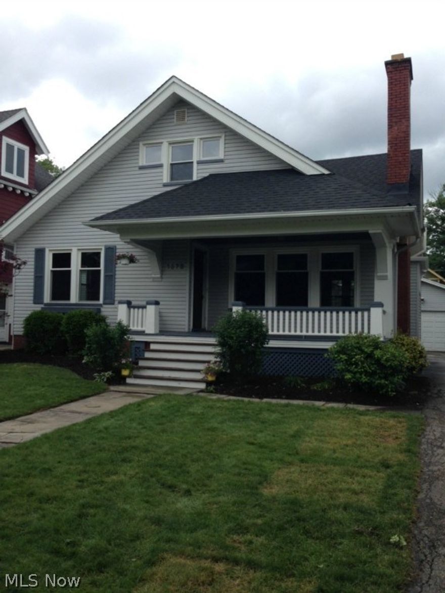 Another amazing Black Dog Renovation! Western Lakewood master bungalow. Spacious open floor plan featuring refinished hard wood floors throughout the home. Two, brand new, full baths. Gourmet kitchen with abundant cherry wood cabinets, gleaming granite counter tops with breakfast bar, new stainless steel range, refrigerator, and microwave. Terrific open floor plan, great for entertaining. Gas fireplace in living room, with refurbished gas unit, and flue. Two first floor bedrooms and full bath. Deluxe second floor master bedroom suite bathed in natural light. Master bedroom walk-in closet with full complement of professionally designed, and installed, shelving and dividers. Master bath with double sinks and marble tiled, glass walled, shower. Neutral color scheme and tasteful fixture selections grace this home! New roof (tear-off) 2015! Low maintenance vinyl siding, energy efficient, vinyl windows, newly installed central air conditioning. New electrical panel. Basement drain tiles repl
