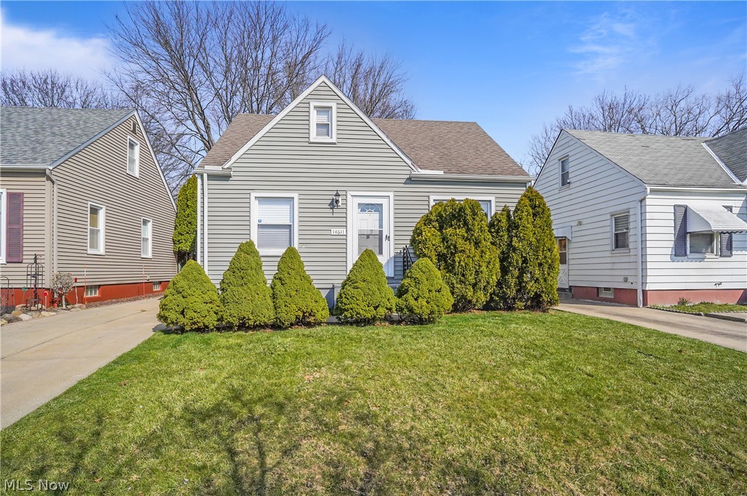 Welcome home to this charming, remodeled three-bedroom, two full bath cape cod. Come into the bright, living room with a large window to let the natural light to shine through with all new flooring, recently been painted, and new trim throughout the home (2024). The gorgeous eat in kitchen has granite counters, stainless steel appliances (2024), and the oven has built in air fry option. To complete the first floor there are two bedrooms and a full bathroom. Upstairs is another large bedroom and walk in closet. The fabulous basement offers a second full bathroom, finished area for more room to entertain, office, etc., laundry area, and storage area. Partially fenced in backyard with covered patio. Garage has electric opener with keypad, and driveway has newer concrete. Roof, A/C, windows, furnace, are eight years old. Ready to move right in!