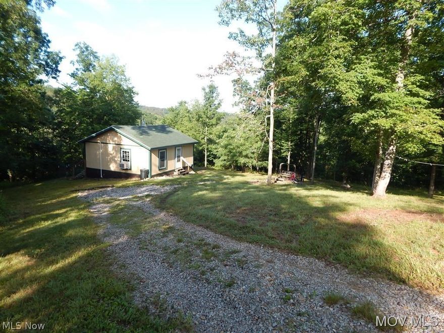 1 bedroom cottage on 5+ acres ready to move in for full time use or just use as a weekend getaway. Located within 3 miles of Rt. 50 4 lane near Pennsboro.Some deed restrictions apply.  Elem: Creed Collins Elementary Schoo  Elem/Bus: Y  JrHigh: Ritchie County Middle School  JrHigh/Bus: Y  High: Ritchie Cty. High  High/Bus: Y  Fire: VOL  Police: SHF  PossFreeGas: N  ;SQFT=Fin Above:576, Fin Total:576, Unfin Above:0;PRKG= Parking Pad