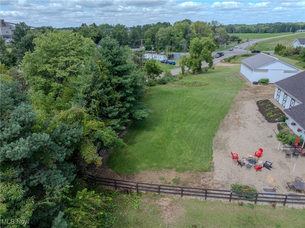 Barndominium, Equestrian Show Barn with indoor Riding Arena, and storage barn on 24.24 acres Zoned for commercial and Multifamily development. Immediate income potential from 2 fully updated living areas with huge garages (24x24 and 16x24).
Custom Built 6 stall barn & Arena, plus a separate 1600 Sq Ft storage building.
Enjoy evenings by the fire pit while you plan your Dream Home in the Beautiful 15 Acre Wooded area! Or, map out your income producing development Venture. The possibilities are endless with the Perry Twp M-D Zoning! Perhaps a Luxury RV park? Your own secluded dream spot? A Great Investment Opportunity for sure!