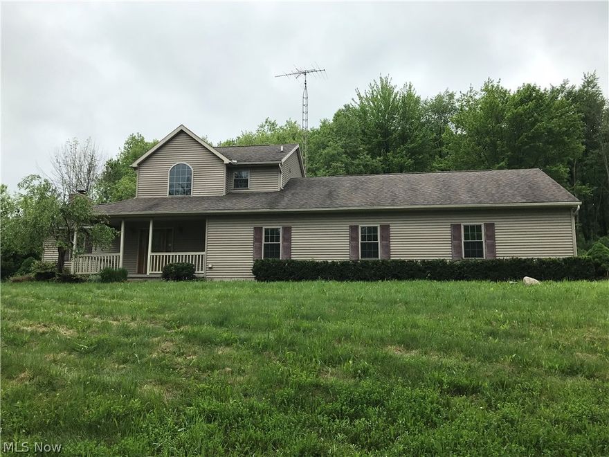 This home sits far off the road on a peaceful 7.6 acre property with a shared lake. Built in 2005 featuring a first floor master suite and a first floor laundry. 
Living room features a vaulted wood ceiling and beautiful fireplace. Plentiful amount of kitchen cupboards with a breakfast bar. Adjoining dining area with wooded view. Two story foyer with oak staircase. Oversized garage with basement access. As is Condition. 203K FHA financing with $2000 IE.