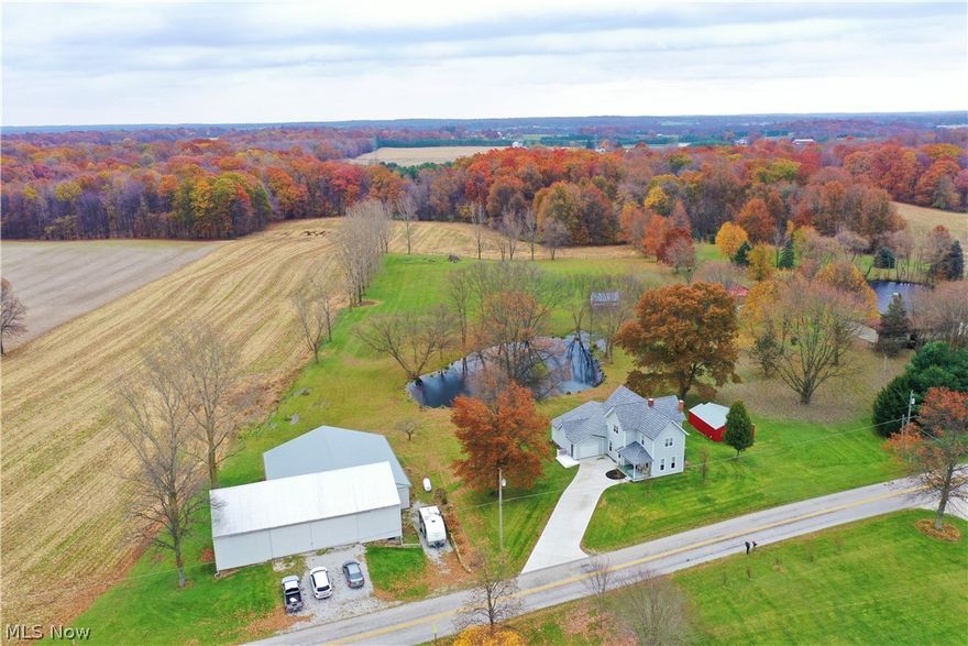 WOW! Welcome to this four bedroom, two full bath home which has so much character and is sitting on 5.22 acres offering tranquility and serenity. Come on up to the covered porch where you can sit out enjoying the postcard setting views of the gorgeous property. This updated fabulous, inviting home offers a living room, family room, new carpet (2019) through out the home, kitchen and the fantastic sunroom which gives you just one more place to sit and enjoy the views. The stunning large eat in kitchen offers stainless steel appliances, Quartz countertops and plenty of cabinets. First floor laundry room. New windows (2015), metal roof (2015). HVAC (2021). Upstairs you will find three large bedrooms, bright full bathroom, master bedroom with master bath and bonus area for a siting area, play area, etc. Let's go outside where you will find a 60x60 workshop-paved (2020), 23x25 shed, perfect for entertaining with finished area or a fabulous office area, new driveway paved (2020). Picture per