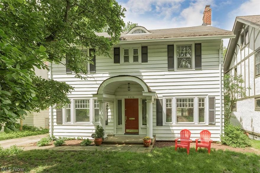 Charming center hall colonial in popular Fernway neighborhood of Shaker Heights! First floor with spacious dining room, eat-in kitchen with all appliances, inviting living room with fireplace and nice family room. Hardwood floors throughout. Second floor has 4 bedrooms and one full updated bath. Spectacular third floor suite with bedroom, office and full bath -- great for a teen, visitor or nanny! Freshly painted throughout! Some newer windows and central air on first floor. Nice backyard and landscaped front yard. Ready to move into and enjoy the summer. Property is violation free. Close to rapid transit which goes to Shaker Square, Tower City and the Airport. Great commute to downtown, universities, hospitals and University Circle!