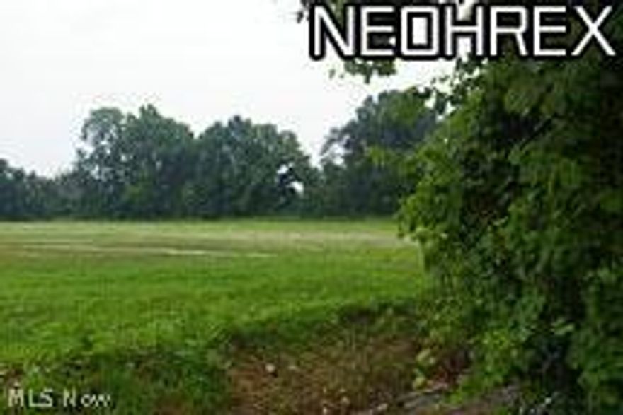 1.5 acre lot. The rear of the property faces north so you can use your patio without being  blinded by the sun on those sunny afternoons. The view of the woods gives you that feel of  serenity. Just a few minutes from OH-2 or I-80/I-90 (Ohio Turnpike) and about 30 minutes  to Cleveland Hopkins Airport; 40 minutes to Lake Erie Islands; 5 minutes to the Lake Erie. There are only a few lots left and this is one of the best remaining in this development. If you'd like to build an outbuilding for your toys'' it's no problem.  Visit our Sales Center. Open Monday-Thursday 2-5. Weekends 1-5. Friday by appointment.