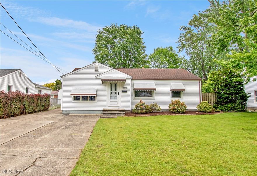 Welcome home to this 3-bedroom, 1 full bath Ranch located in Eastlake.  This well-maintained property has been lovingly cared for by the same owner for many decades.  Upon entering the house, you step into the bright living room.  Ahead is the eat-in kitchen, which features lovely oak cabinets, Corian countertops, a tile backsplash, and comes with all appliances.  At the heart of this home is the 4-seasons room addition. It can be accessed through sliding glass doors off the eat-in area of the kitchen.  It features lovely wood paneling and a beamed vaulted ceiling.  There are multiple sliding glass doors, providing access to the back yard,  a ton of natural light, and, when opened, a refreshing breeze.  There are 3 nicely sized bedrooms, all with ample closet space. The full bath has ceramic tile flooring, a pedestal sink, and a tub and shower surround with a glass door.  The laundry/mudroom is adjacent to the kitchen and includes a service door to the side lot.  The washer and dryer are included.  Outside, you will find a fully fenced backyard and a 2-car detached garage.  The home is located on a quiet street in close proximity to the Lake County YMCA, which offers a large pool, park, pavilion, and playground area.  This great home is in move-in condition and ready. Call today to schedule a showing!
