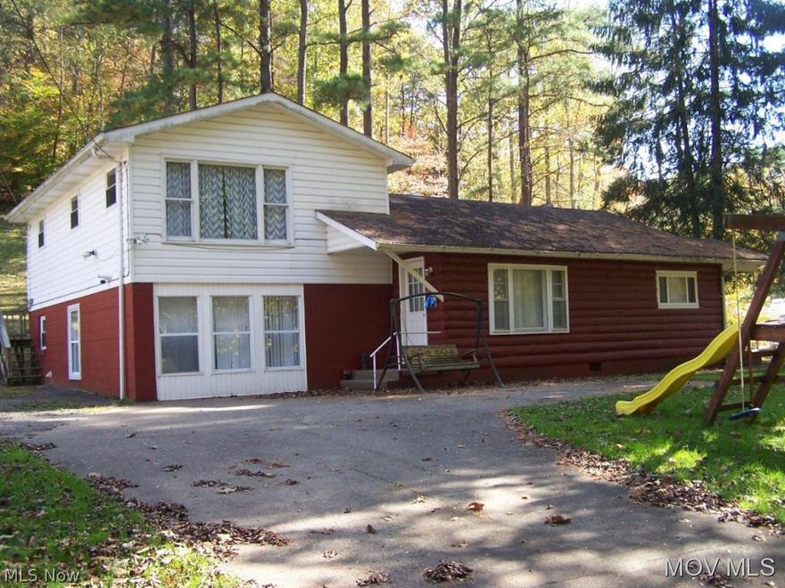 Beautiful well maintained log home. 10+ Acres. Modern updated kitchen with birch counter tops, dining room, spacious living room with natural gas log fireplace. 4 bedrooms (master with private deck) Laundry/utility room with shower. Mud room. Nice 24x32 garage with attached oversize carport for RV, boat, etc. Nicely maintained property. Many updates/upgrades. Small stream borders property. No zoning and no restrictions. Partial mineral rights. Excellent location.  Elem: Spencer  Elem/Bus: Y  JrHigh: Spencer Middle  JrHigh/Bus: Y  High: Roane County  High/Bus: Y  Fire: VOL  Police: SHF  PossFreeGas: N  ;SQFT=Fin L1:1005, Fin L2:405, Fin Bsmt:0, Fin Above:1520, Fin Total:1520, Unfin L1:0, Unfin L2:0, Unfin Bsmt:0, Unfin Above:0;GAR= 4 Car Detatched;PRKG= Off Street, RV Parking