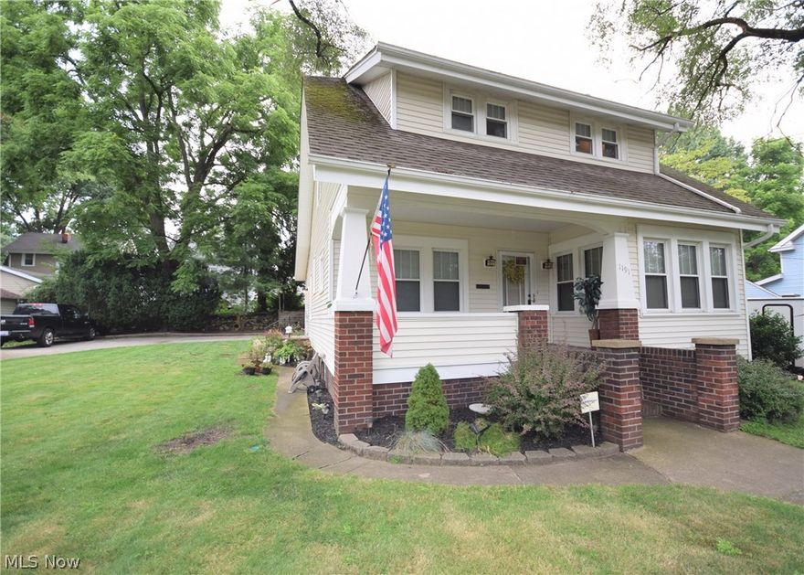 Wow, this feels like home!   That is exactly what you will say upon stepping into the beautiful kitchen with custom painted cabinets, large center island and granite counter tops. Three bedrooms, 1.5 bath home located on quiet street in highly desirable North Hill neighborhood.  You will love the cozy fireplace, neutral décor, and nice layout of this home.  Perfectly landscaped, with roomy 2 car garage, ample off street parking, and large double lot.  Nicely maintained Hardwood floors throughout! No worries as this one comes with America's Preferred Home Warranty.  Call today to schedule your showing!  You won’t be disappointed!