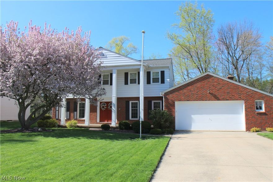 Awesome 2 story in Copley Fairlawn Schools . 4 bedrooms and 2. 5 baths. Foyer with updated exterior doors with glass sidelights and newer laminate floors. Fabulous remodeled kitchen with maple cabinets, and granite countertops, tiled backsplash and stainless steel appliances.Formal dining and living room plus first floor den with wall of built in oak cabinets. Warm and cozy family room with brick wall gas fireplace. Glass french doors leads to newer paver patio with fire pit. Professionally landscaped and gorgeous- relax and enjoy the mature tree lined backyard- great views of woods and meadows- no back neighbors!! Rec rooms in Lower level with newer carpet. Master bedroom with remodeled bath , dressing table and walk-in closet. Master bedroom and second bedroom with wood floors. Basement was waterproofed, Updated roof- tear off with 40 year shingle. Newer furnace, air and most windows have been replaced too- Just move in and relax.