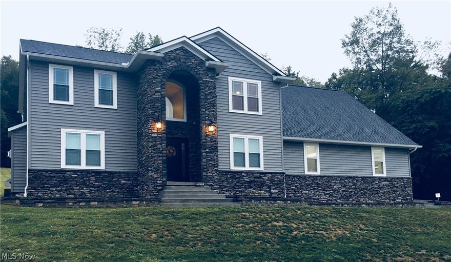 Beautiful newer construction in a great south side location.  Large lot. Custom built home completed in 2016.  This modern home features Coretec Luxury Vinyl in much of the main level.  The living room has a gas fireplace.   The stunning kitchen with white cabinets, also features Cambria quartz countertops, and stainless steel appliances that will stay.  There is a large 3 car garage.   Master bathroom has a corner jet tub,  separate tile walk-in shower,  and a beautiful walk in closet.  Some other features are a second floor laundry room and a Dawson home security system.   Move in ready!  This is a must see!