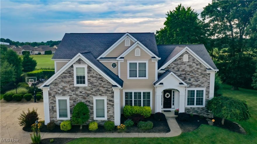 Experience elegance, comfort, and resort-style living in the prestigious Firestone Farms community. Built in 2006, this beautifully maintained 4-bedroom, 3.5-bathroom home sits on nearly an acre of professionally landscaped land. Enjoy privacy and tranquility in a backyard oasis that features a 20x40 heated in-ground saltwater pool with water fountain feature, an auto cover and diving board, surrounded by an expansive stone patio, a cozy stone fire pit, mature trees, and a wrought iron fence. Custom LED lighting sets the tone for evening entertaining and relaxation with gorgeous sunset views. Inside, the main floor boasts rich cherry wood cabinetry in the eat-in kitchen, oak hardwood floors and a bright and functional layout. Custom built-ins frame a warm gas fireplace in the main living area. A formal dining room is right off the kitchen. A bonus room on the main floor offers flexible use as a home office or guest suite, and the first-floor laundry room provides added convenience and storage. Upstairs, the owner’s suite offers dual closets with one being a walk-in closet. A newly renovated spa-like bath, complete with a freestanding soaker tub, oversized shower, private toilet room, double vanity and refined designer finishes. 3 additional bedrooms are on the top floor. All bedrooms feature custom built in storage. One room even has hidden doors in the shelving that lead to more storage! The walk-out basement is an ideal space for entertaining or hosting overnight guests as it offers a full size bathroom. The 2.5 car garage includes an EV charger and new epoxy flooring. The home has an upgraded electrical panel. Just minutes away at the Town Center, you can experience fine dining, free movie and concert nights during the summer and many more community events! With curated updates, premium features, and a dream location—this home is a rare gem in one of the area’s most sought after neighborhoods. Don't hesitate, schedule your showing today!