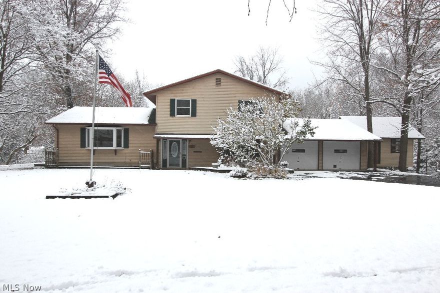 One owner home on Sprawling Acreage with Creek in private quiet area of Vermilion! Firelands Schools. A first floor bedroom and full bath offer lots of options! Freshly painted and some newer carpet make this a comfortable move in ready home! Lots of space to spread out in the large living room or the open family room with fireplace or relax in the three season/sunroom with skylites overlooking the wooded back yard. Updated eat-in kitchen with some appliances that stay including the Washer & Dryer! A clean dry basement with an added room for crafts or office. Wall unit air conditioning keep the home cool in the summer and radiant zoned heat keeps cozy in the winter! A bonus shed and an dded 16x16 work shop included too! Call for a private showing.