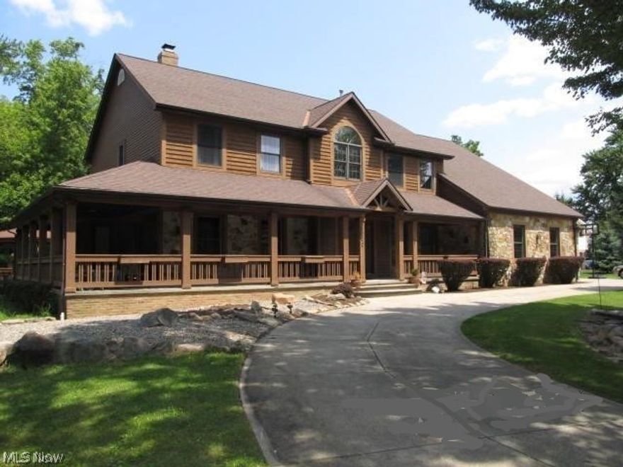 This pristine colonial has everything for you including an In-law suite! It features an extremely spacious updated kitchen that includes an island, ceramic floor, plenty of cupboard space and a large eating area. The eating area leads out to gorgeous deck overlooking a private park like yard that all ages will enjoy. Adjoining the kitchen is great room with plenty of natural light and a two-sided fireplace. From the great room you can access the porch that wraps around the house another extraordinary feature. The living room shares the two-sided fireplace and is a great place to relax. There is a 14x11 office with wood floors perfect for the professional or student. All four of the bedrooms are of very good size with the master having two walk in closets and a Mstr. bath that includes a jet Jacuzzi tub. The home has solid oak six panel doors throughout. The lower level has a 30x24 area with a full bath & a 30x14 area that can be turned into your personal gym or a hobby or work shop are