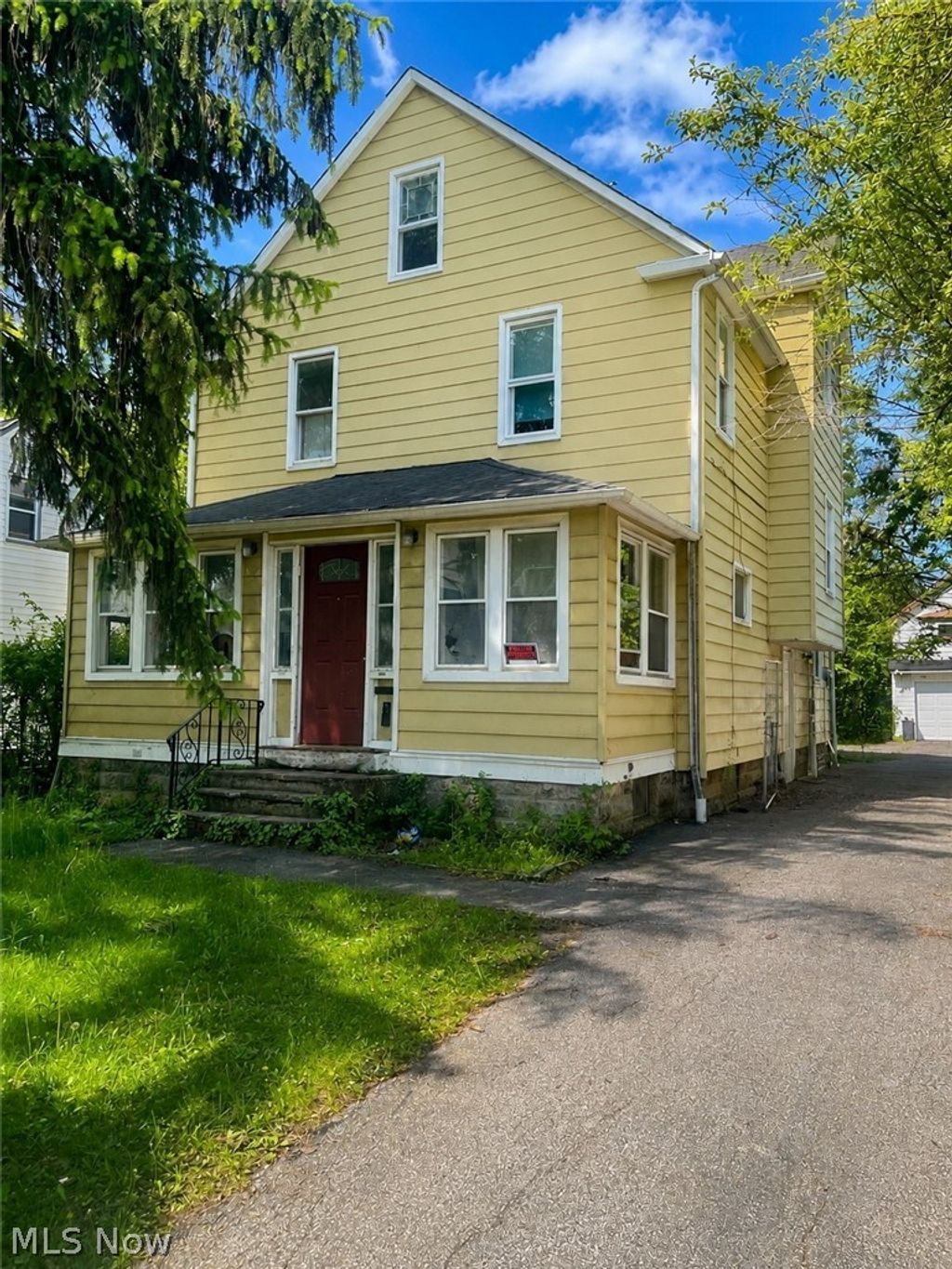 Photo of 1304 E 188 Street, Cleveland, OH 44110 (MLS # 5209566)