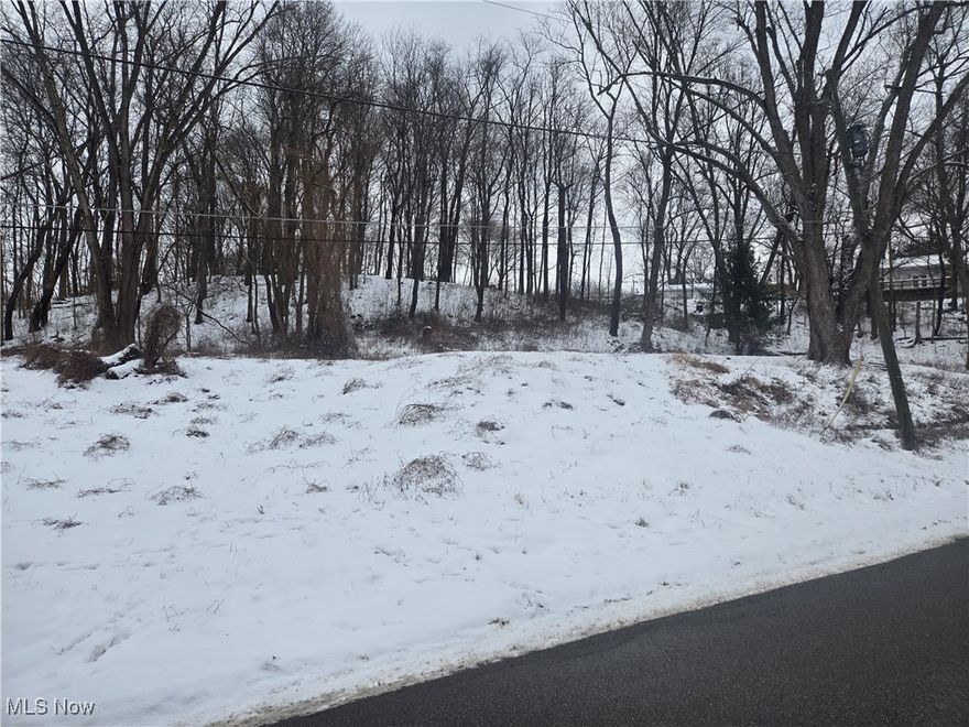 Conveniently located lot that sits just under 1 acre with convenient access to all amenities as well as easy access to I70 East and Westbound. Property has some thin wooded area as well as an open area that would be great for building a home.