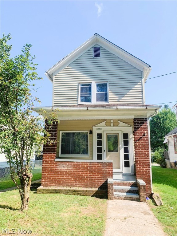 UPDATE: This recently renovated 2 bedroom 1.5 bath home in Wellsville has it all! From beautiful laminate floors throughout to a new kitchen with radiating countertops, come see the new backsplash, bathrooms, vanity, window coverings, lighting throughout the home, and much more! With an attached garage that's covered, this part of the home can be used as a lounge or mini rec room. There is also a completely redone basement with a half bath with newer windows throughout this home, a lot of natural light.