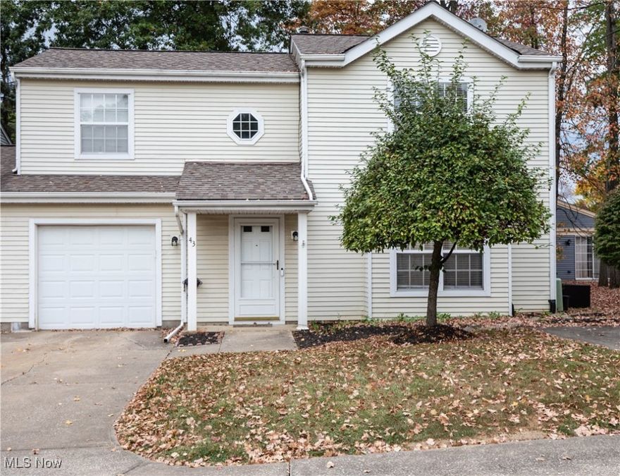 Welcome to this updated condominium in a prime location! This move-in ready home features newer laminate wood flooring throughout, updated light fixtures, fresh paint, and stainless steel appliances that remain, including washer and dryer. The kitchen offers custom cabinetry, quartz countertops, and a newer sliding door to the patio. The spacious living/family room provides comfort and style with newer flooring. Convenient first-floor half bath and laundry. Upstairs includes three bedrooms and a full bath. Attached garage. Excellent location near shopping, dining, and all amenities. Truly turn-key and ready for new owners.