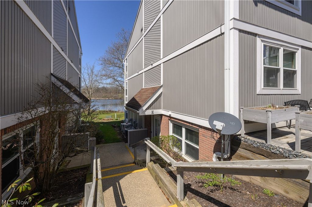 Photo of 243 Portage Lakes Drive #E, Akron, OH 44319 (MLS # 5200076)